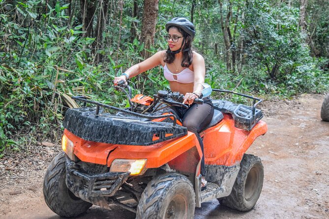 The best adrenaline day Atvs shared, ziplines and cenote Playa del Carmen - A short swim in a Maya cenote