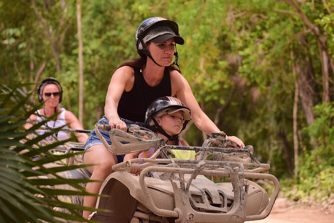 Tulum Adrenaline Tour ATV Ziplines and Cenote Swim Day - Swimming underground in the cenote