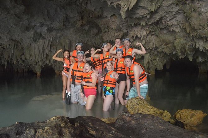 Tulum Adventure (archeological zone-Atv-ziplines-cenote-lunch-drinks-rappel) - Swimming through the cenote cave